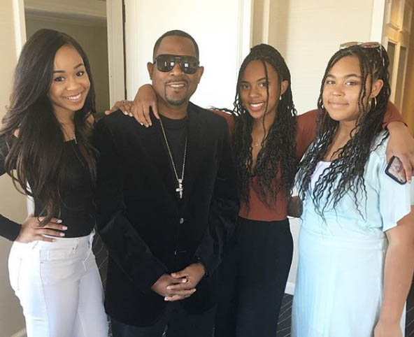 A photo of Martin L with his daughters.